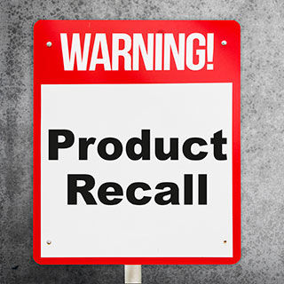Red and White Warning Sign - Lead Image for Product Liability Insurance Page