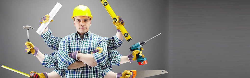 Inszone Insurance Business Insurance Page Banner - Man Using Multiple Construction Tools