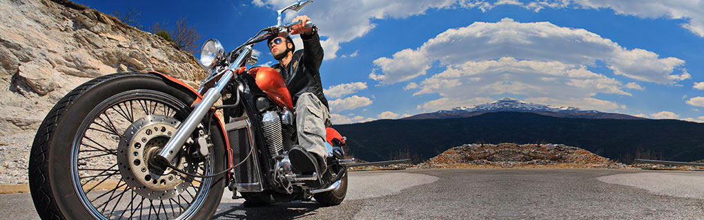 Inszone Insurance Motorcycle Insurance Page Banner - Male Driver Riding a Motorycle