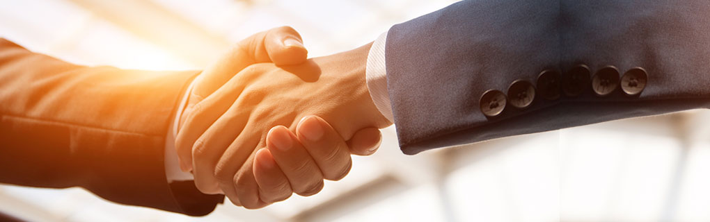 Inszone Insurance Our Partners Page Banner - Business Men Shaking Hands