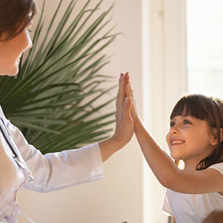 Inszone Insurance Health Insurance Page Banner - Father and Daughter Consulting Female Doctor and High-Fiving